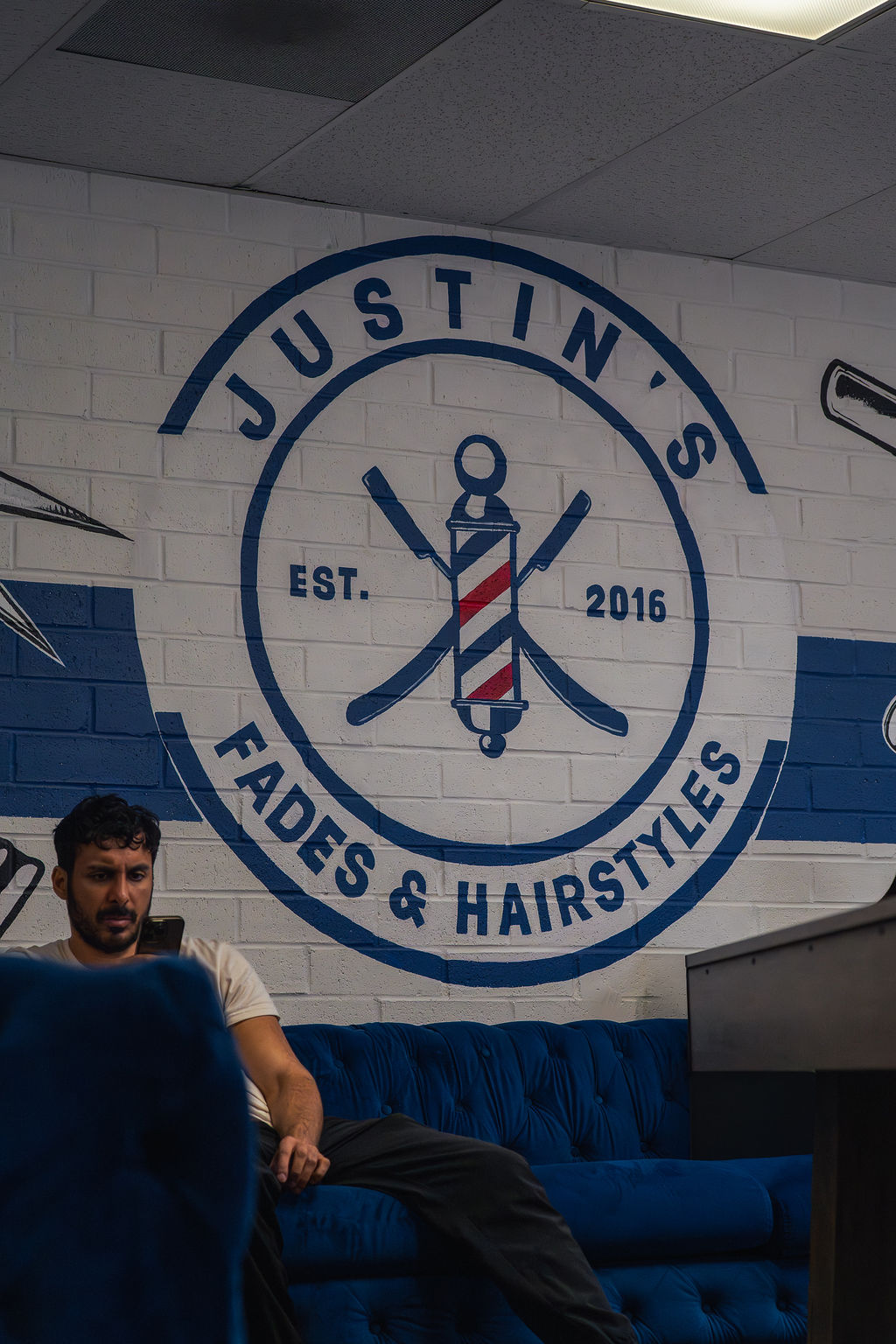 The chair — barber at work at Justin's Fades.